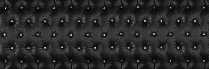 horizontal elegant black leather texture with white buttons for pattern and background