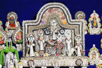 Durga Maa made by conch shell. Colorful handcraft for interior decoration.