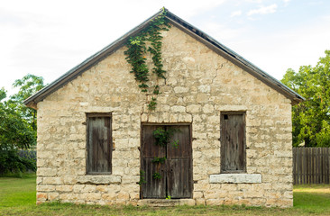 Fototapeta na wymiar Rustic stone building cottage