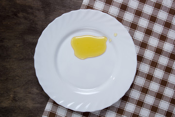 White plate with honey