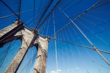 Fotobehang Brooklyn bridge with clear deep blue sky. NYC. © Pineapples