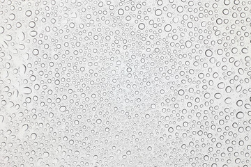 Water drops on glass, Rain droplets on glass background.
