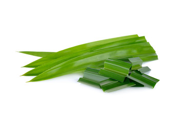 portion cut fresh pandan leaf on white background