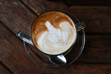 Latte with leaf frothy foam