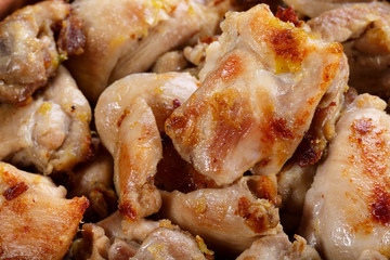 Roasted chicken meat pieces.