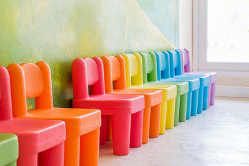 Colourful chairs in the playroom