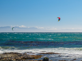Kite surfers in action on a windy day