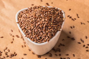 Flax seeds linseed in white bowl