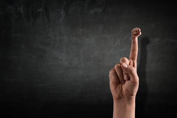 Showing fist gesture .