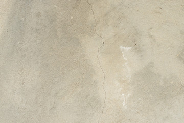 Wall fragment with scratches and cracks