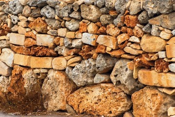Stone wall in different colors.