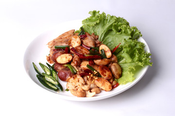 Spicy fried jackfruit seeds and chicken with roasted chile paste.