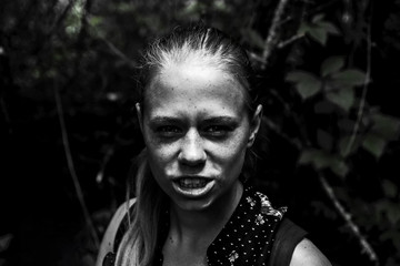 Dark contrast portrait of a young girl