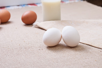 The eggs on a linen tablecloth. Household.