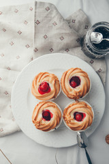 Pastries and desserts in the composition in rag background