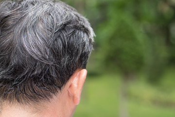 Obraz premium old senior or middle aged man with grey hair problem