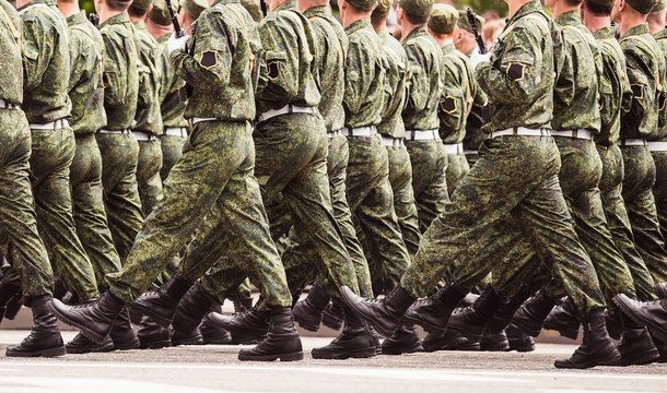 military men marching to victory parade