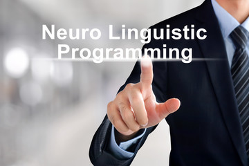 Businessman hand touching  Neuro Linguistic Programming (or NLP) sign  virtual screen