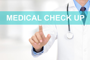 Doctor hand touching MEDICAL CHECK UP sign on virtual screen