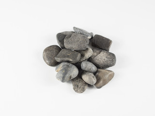 River stones over white isolated background from top view
