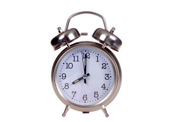 Old fashioned style alarm clock set to 8 o'clock. 8 AM is a common start time for grade school children and work for adults. Eight PM is a common bedtime for kids. Time concept. Isolated on white.