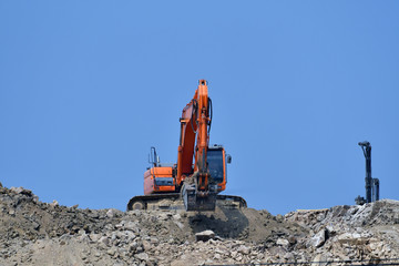 Obraz premium Excavating excavators