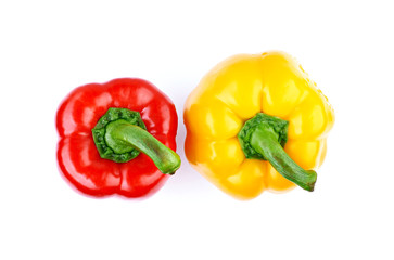 Sweet red and yellow pepper or paprika isolated on white background. Top view.