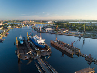 Fototapeta na wymiar The ship is at the dock of the shipyard. Riga, Latvia, Daugava.