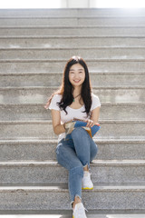 Obraz premium Happy Female College student