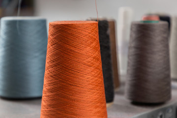 cones of thread ready for weaving