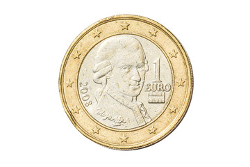 Austrian coin of one euro closeup with symbol head of Wolfgang Amadeus Mozart, the famous Austrian composer from Austria. Isolated on white studio background.