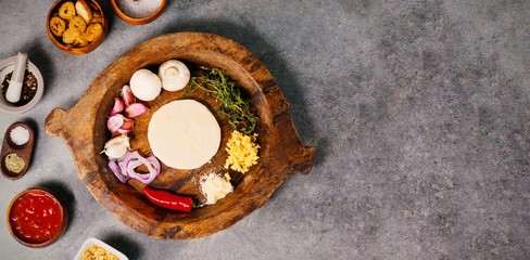 Ingredients in wooden containers on table