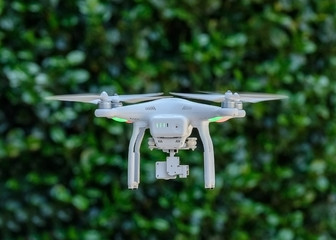 white drone in flight