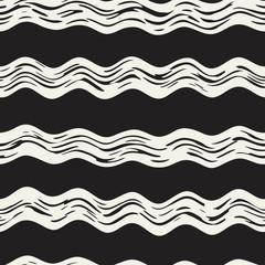 Decorative seamless pattern with handdrawn doodle lines. Hand painted grungy wavy stripes background. Trendy freehand texture