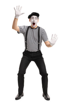 Mime Holding His Hands On An Invisible Wall