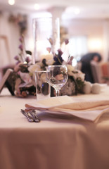 Wine glasses on the table served for the reception in the restaurant