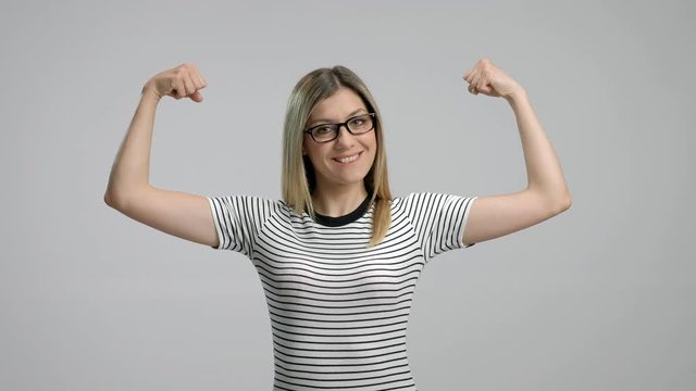 Woman flexing her muscles