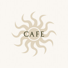 The word coffee on a brown sun