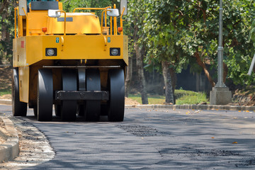 the road rollers working on the new road construction