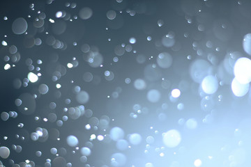 A beautiful and blurry bokeh on a blue background.