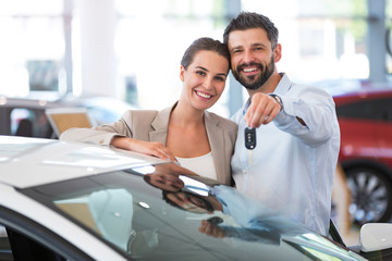 Young couple buying a car

