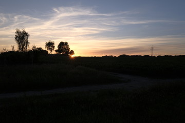 Fototapeta na wymiar Ritterhude im Sommer bei Sonnenuntergang
