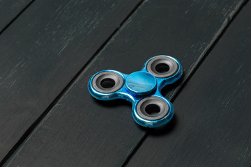 spinner on a wooden table. close up