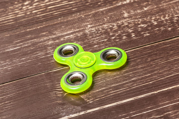 spinner on a wooden table. close up