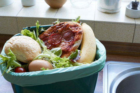 Fresh Food Waste In Recycling Bin At Home