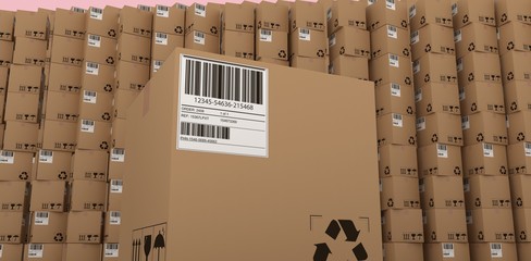 Recycle icon and barcode on packed cardboard 