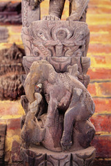 Fototapeta na wymiar Anthropomorphic elephants. Wood carving on a temple in Bhaktapur
