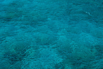 Natural background of emerald, turquoise sea water