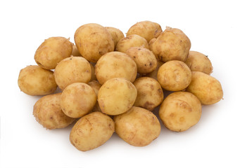 Heap of a new potato tubers isolated on white background.