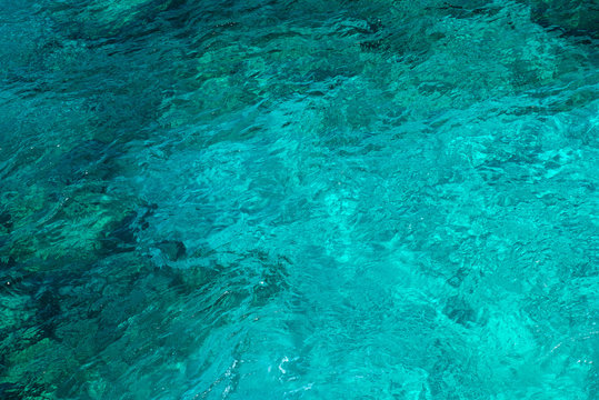 Fototapeta Natural background of emerald, turquoise sea water